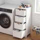 White wooden storage organizer with four drawers, designed for narrow spaces, ideal for bathroom or laundry use.