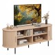 Fluted TV stand with natural wood finish, featuring 8 compartments and 5 metal legs, ideal for living room organization.