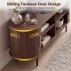 Fluted TV stand with sliding tambour door design, walnut finish, and spacious compartments for organized storage.