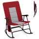 Foldable rocking padded camping chair in red with backrest and armrests, ideal for outdoor and indoor relaxation.