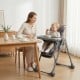 High chair in gray with soft PU cushion and three adjustable footrest heights, ideal for comfortable feeding.