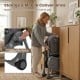 Foldable high chair in gray with detachable cushion, featuring wheels for easy movement and compact storage convenience.