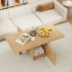 Foldable coffee table with storage cabinet in oak, featuring a rolling bracket and compact design for space-saving.