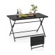 Foldable black metal outdoor dining table with slatted tabletop, perfect for patios and gatherings, shown in upright.