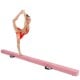 Young gymnast performing on a pink portable balance beam, featuring a sturdy pine wood core and soft suede surface.