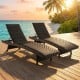Folding padded rattan chaise lounge set of 2 with adjustable backrests, perfect for poolside relaxation and easy storage.