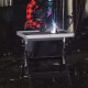 Folding welding table with 4-level height adjustment and 2 fixed wheels, ideal for efficient welding and tool.