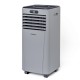 Portable 10000 BTU air conditioner in gray with remote control, ideal for cooling bedrooms and small apartments.