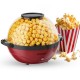 Red 6QT stirring popcorn popper with nonstick plate, making 24 cups of popcorn for family movie nights and easy.