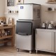 Freestanding commercial ice maker with stainless steel finish, producing 450 lbs of ice daily, ideal for busy.