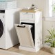 Freestanding tilt-out laundry cabinet in white with bamboo top and removable basket, perfect for laundry storage.