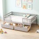 Full size gray daybed with fence and two pull-out drawers, perfect for children's storage and safety.
