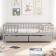 Gray full-size daybed with fence and two storage drawers, perfect for children's rooms and organized play areas.