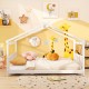 House-shaped full size Montessori floor bed in white with supportive headboard, perfect for children's creativity and.