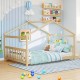 House-shaped Montessori floor bed in white with supportive headboard, designed for children's creativity and comfort.