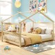 Full size house bed in white with decorative lights and a cozy layout, perfect for imaginative children's play and.