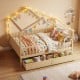 House-shaped full-size bed with fence rails, natural wood, featuring storage drawers and playful design for kids.