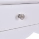 Close-up of the vintage metal handle on the white side sofa table with three storage drawers for elegant decor.