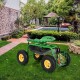 Garden cart rolling work seat in green with tool tray and large wheels, perfect for comfortable gardening tasks.