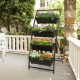 4-tier vertical raised garden bed with 4 black containers, featuring drainage holes, perfect for patio or balcony.