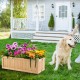 Folding wooden raised garden bed with colorful flowers, ideal for patio or garden, featuring removable bottom for easy.