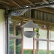Hanging bird feeder and bath with weatherproof dome, featuring a rust-proof metal frame and easy-fill design for wild.