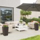 Two brown wicker flower pots with drainage holes, perfect for outdoor decoration and plant cultivation on a patio.