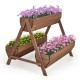 A side view of the vertical raised garden bed showcasing three planter boxes filled with colorful flowers, made of fir.