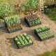 Three-tier heavy-duty metal raised garden bed planter boxes in black, ideal for growing vegetables and flowers outdoors.