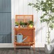 Folding garden potting bench with teak oil finish, showcasing a shutter-shaped design for enhanced ventilation and.