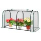 Mini tunnel greenhouse with roll-up zipper door, PE cover, rustproof frame, ideal for protecting potted plants.