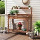 Outdoor wooden garden table work station featuring a spacious top shelf and sturdy slatted bottom shelf for plant.