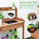 Outdoor wooden garden table work station with removable sink, storage shelves, and drawer for organized gardening tasks.