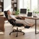 Height adjustable gaming chair with headrest and retractable footrest, designed for comfort during work and relaxation.