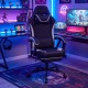 Height adjustable gaming chair in black with ergonomic design, headrest, footrest, and 360° swivel for comfort.