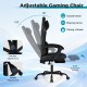 Height adjustable gaming chair in black with headrest, lumbar support, and retractable footrest for ergonomic comfort.