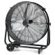 Industrial drum fan with a sturdy black frame, designed for ventilating large spaces and improving air quality.