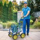 Garden hose reel cart in blue with 4 wheels, storage basket, and foam-padded handrail for easy maneuvering.