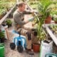 Garden rolling workseat in blue with 360° swivel seat, adjustable height, and ergonomic design for gardening tasks.