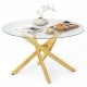 Round glass coffee table with a golden geometric metal frame, featuring a tempered glass top for modern aesthetics.