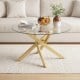 Round glass coffee table with a golden geometric metal frame, featuring a clear tempered glass top for modern.