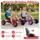 Two kids riding red and pink go karts with adjustable seats, promoting balance and coordination for outdoor fun.