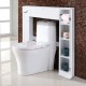 White wooden over the toilet storage cabinet with shelves and paper holder, ideal for maximizing bathroom space.