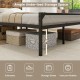 Under-bed storage space of the Platform Full/Queen Bed, showcasing boxes and suitcases for organized living.