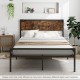 Platform full/queen bed with rustic headboard, metal frame, and ample under-bed storage for a cozy bedroom setup.