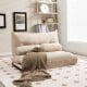 Adjustable floor sofa bed in beige with two lumbar pillows, perfect for living room or bedroom relaxation.