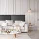 Upholstered wall-mounted headboard in breathable PU leather with sponge padding, ideal for enhancing bedroom decor.