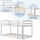 Twin size bunk bed in white with high guardrails and integrated ladder, designed for kids' rooms and space-saving.