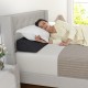 Twin size bed wedge pillow with storage bag, supporting spinal alignment and providing comfort for reading and sleeping.
