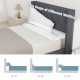 Trapezoidal bed wedge pillow fills gaps of 0”-8”, supports spinal alignment, and includes side storage pockets.